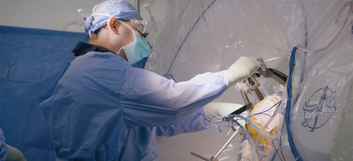 Dr. Iahn Cajigas operating on a patients brain.