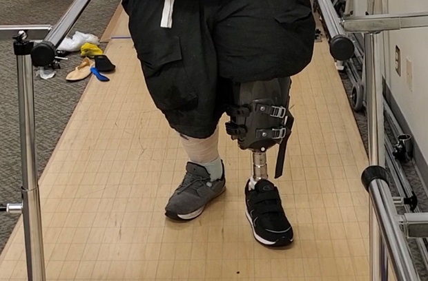 man in physical rehab