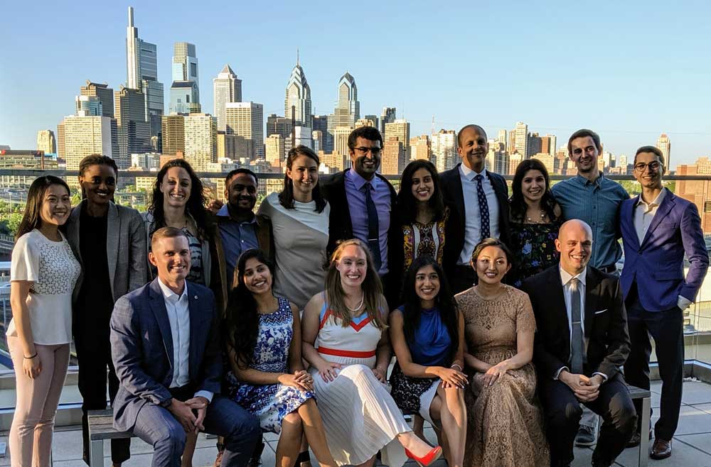 Residents with philly skyline in background