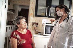 patient and certified home infusion nurse