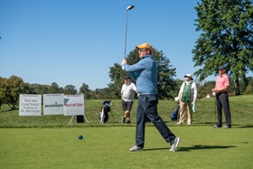 man golfing