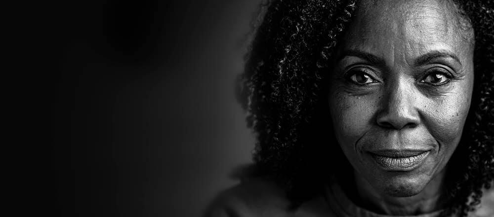 black and white photo of a woman face