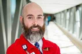 Headshot of Louis Mello, a patient and guest ambassador