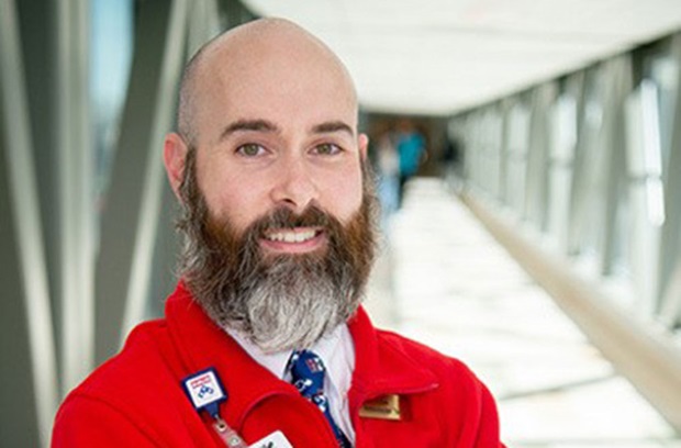 Headshot of Louis Mello, a patient and guest ambassador