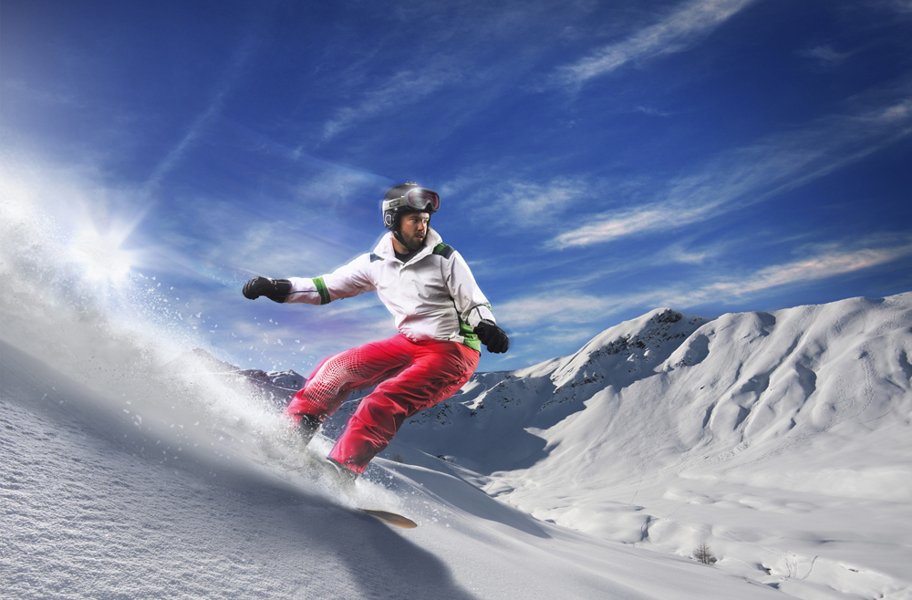 Chris, a Sports Medicine patient, snowboarding