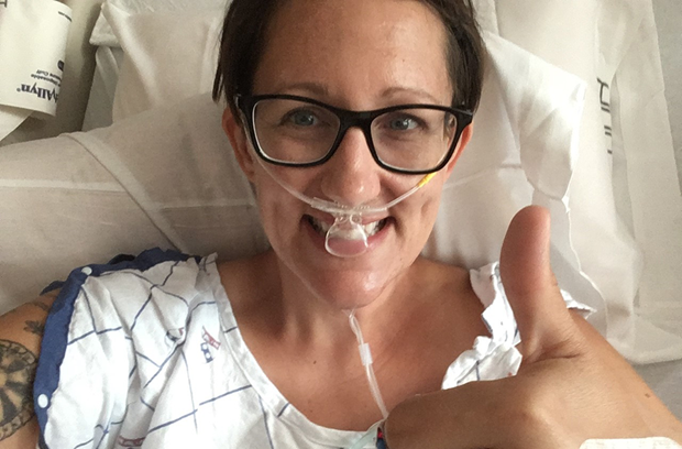 Kelly in hospital bed