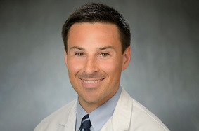 Portrait of Dr. Stephen Bagley in his white coat.