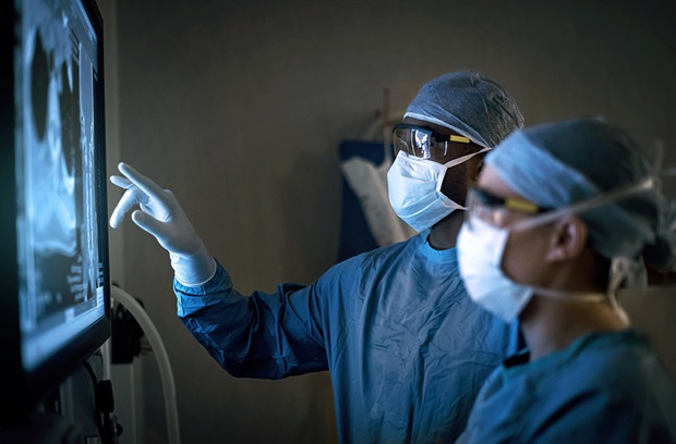 Doctors looking at x-ray
