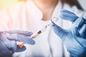 female provider holding a botox injection