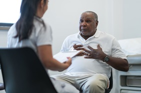 Senior Man With Female Doctor