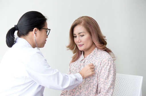 woman getting a heart exam
