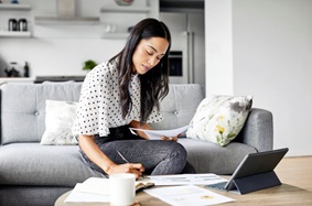 Young woman Taking Notes