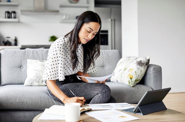 Young woman Taking Notes