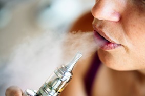 Young Woman Vaping