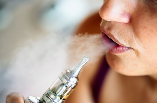 Young Woman Vaping