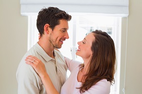a man and woman hugging