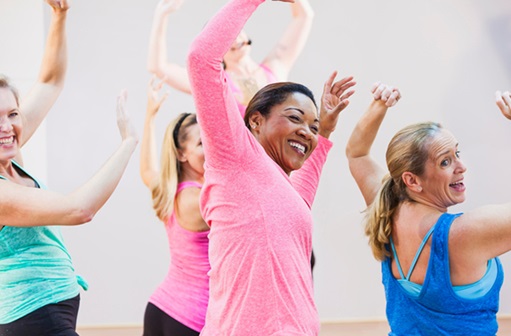 Women working out together inside