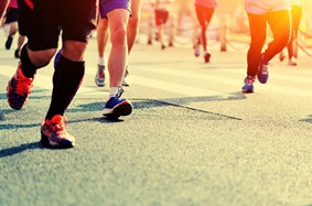 Runners on city street