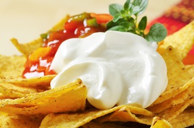 Healthy nachos with sour cream