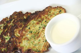 Zucchini and potato pancakes with tzatziki