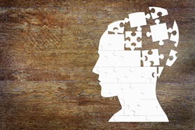 Image of head with puzzle pieces