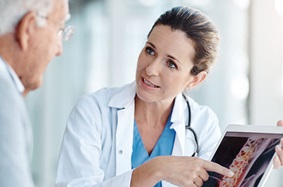 doctor explaining spinal injections