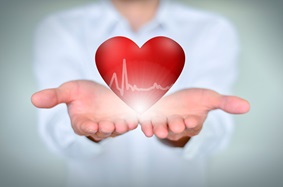 outstretched hands holding an animated heart