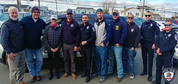 Chief Robert Burnaford with members of the Harvey Cedars Police Department and his parents Don and Debbie.