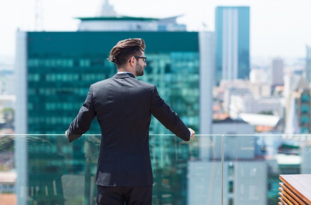 man looking at skyline