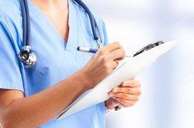 Nurse holding a clipboard