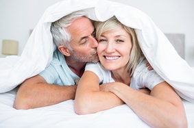 older couple kissing
