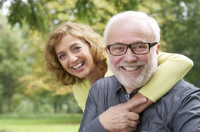 an older couple smiling