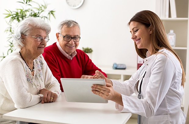 older couple talking to doctor