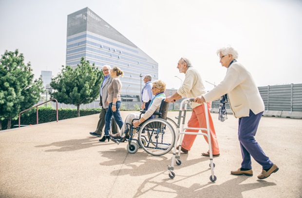 Elderly people walking outside
