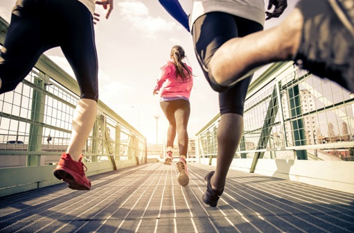 three people running together