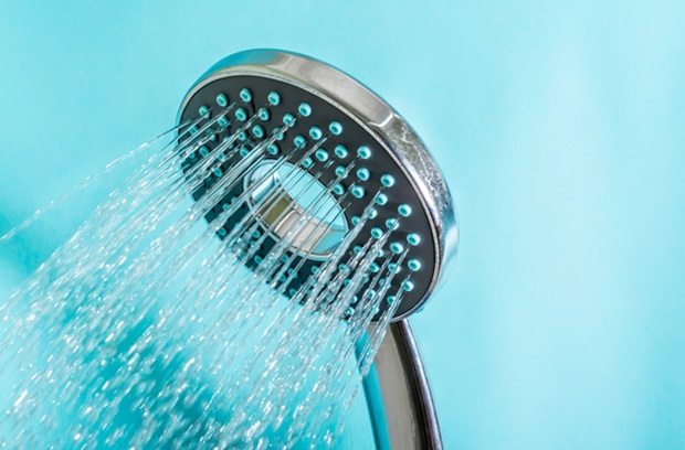 A shower head with water pouring out
