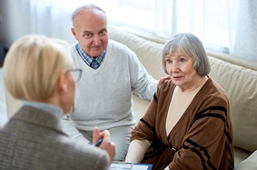 couple talking to social worker
