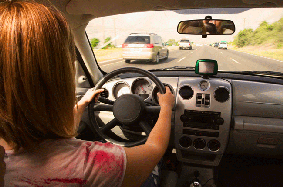 woman driving in car