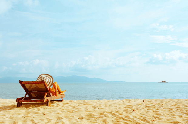 Woman lying on beach chair