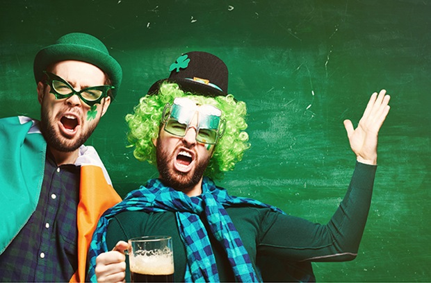 two-men-in-green-drinking-beer-on-saint-patricks-day
