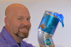 michael burton with an aquarium in the background