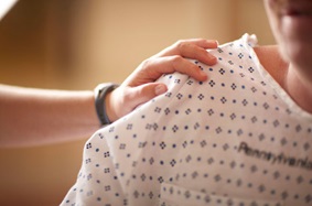 Hand on patient's shoulder