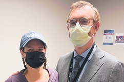 Kasie Hunt, CNN+ Anchor, standing with Dr. Daniel Yoshor, chair of Neurosurgery.
