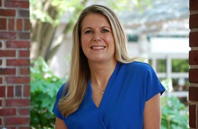 Dr. Danielle Sandsmark smiling outside