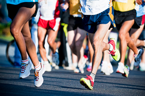 A group of people running in a marathon