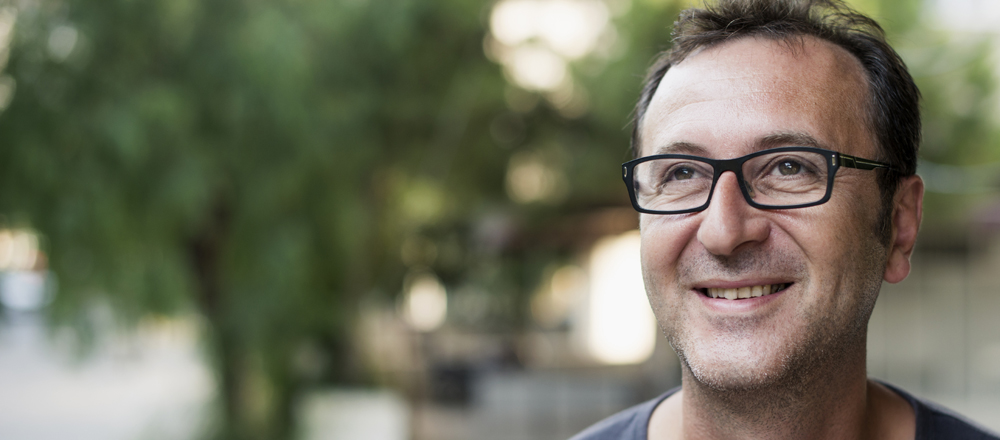 Smiling man wearing glasses