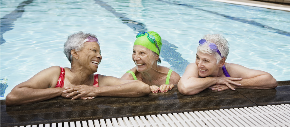 Three women in a swimming pool