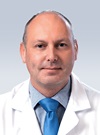 headshot of Gary Alan Bass, MD, MS, MBA, MRCSI, PhD, FEBS (Em Sure)