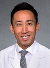 headshot of John Miura