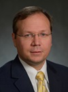 headshot of Phillip Mucksavage,  MD